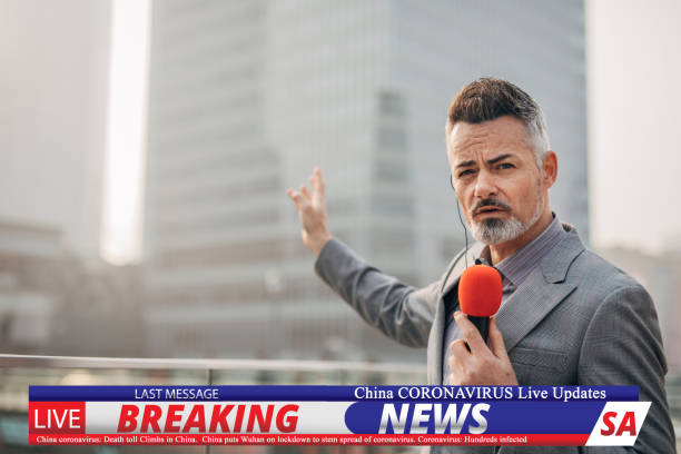 istock Breaking news reporter reporting on coronavirus from China 1202550176