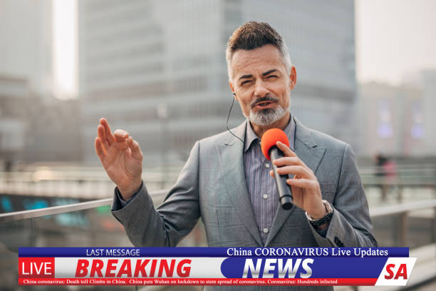 istock Breaking news reporter reporting on coronavirus from China 1202550188