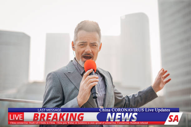 istock Breaking news reporter reporting on coronavirus from China 1202550224