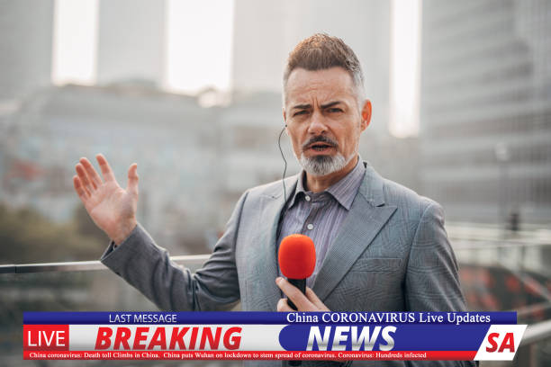 istock Breaking news reporter reporting on coronavirus from China 1202550245