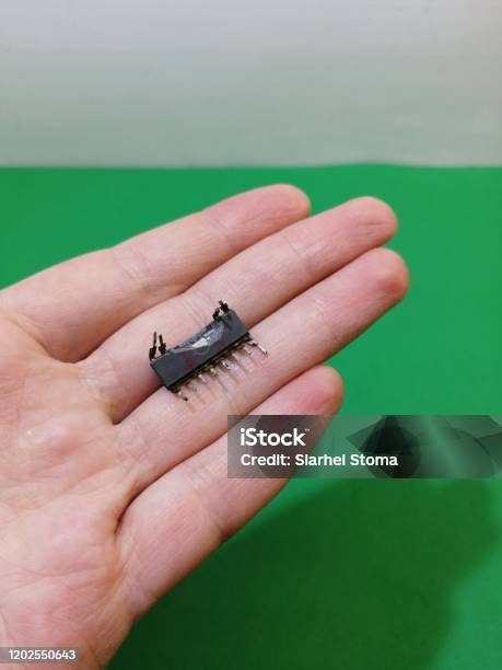 Old Computer Microchip Damaged Old Microchip On A Hand Stock Photo - Download Image Now ...