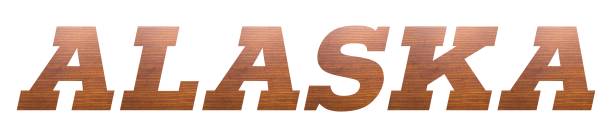 istock ALASKA with brown wooden texture on white background. 1202551216