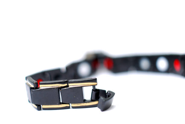 istock neodymium magnetic bracelet on white background, shallow dof 1202552711