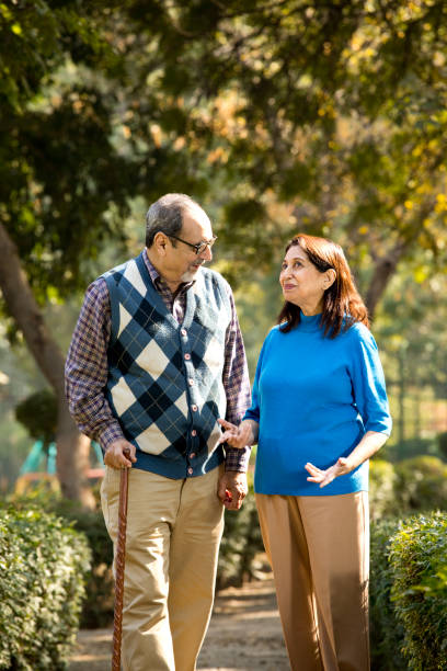 istock Happy senior couple admiring view at park 1202554348