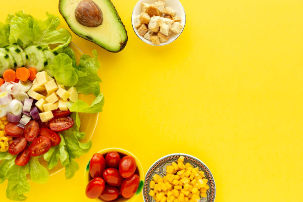 istock lettuce salad with tomato, cheese and vegetables 1202556638