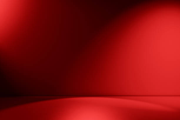 Beams of spotlight on a red background Red empty Studio room for product placement or as a design template with wall angle in a full frame view spot lit photos stock pictures, royalty-free photos & images