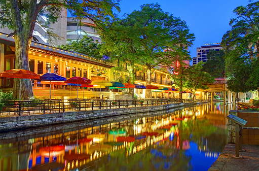 The San Antonio River Walk is a city park and network of walkways along the banks of the San Antonio River, one story beneath the streets of San Antonio, Texas, USA.