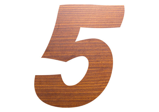 istock Number 5 with brown wooden texture on white background. 1202563941