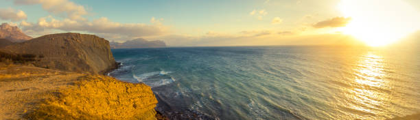 istock Dawn on the sea coast 1202565265
