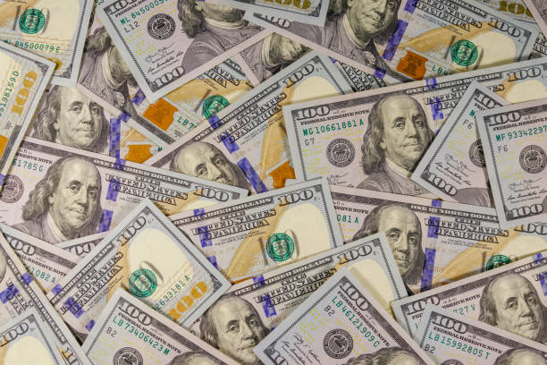 istock Background of american one hundred dollar bills 1202567885