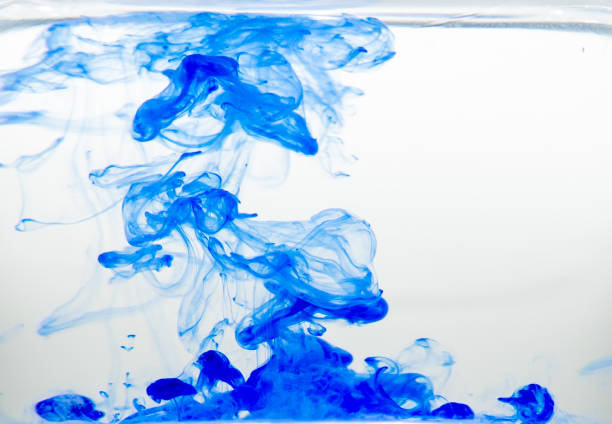 istock Watercolor pigment on transparent water 1202577445