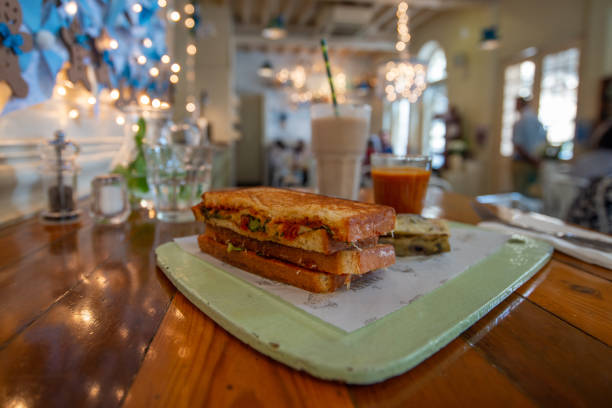 istock A tasty sandwich on a painted board 1202580592