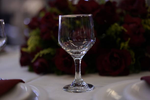 istock cup on the table with white lining, red flower arrangement on blurred background 1202580599