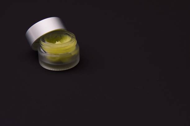 istock Avocado butter in a frosted glass jar 1202580641