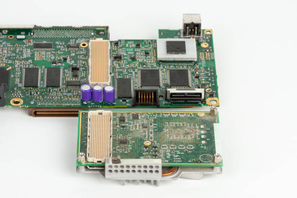 istock Close up of  laptop processor with cooler  and motherboard old laptop with empty socket base for CPU on white background 1202584024