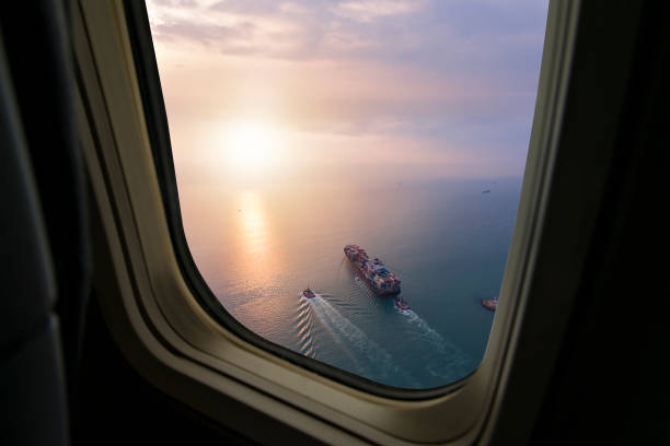 istock Aerial view of cargo ship in transit. 1202585458