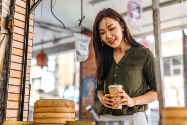 istock Woman shopping for steamer basket 1202587843