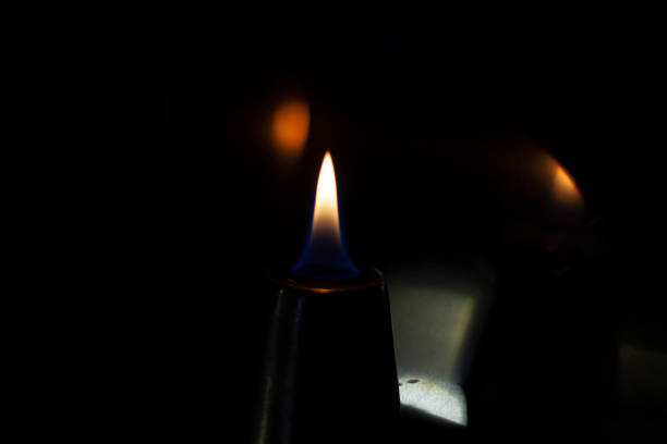 istock Flames of fire in the dark. 1202591219