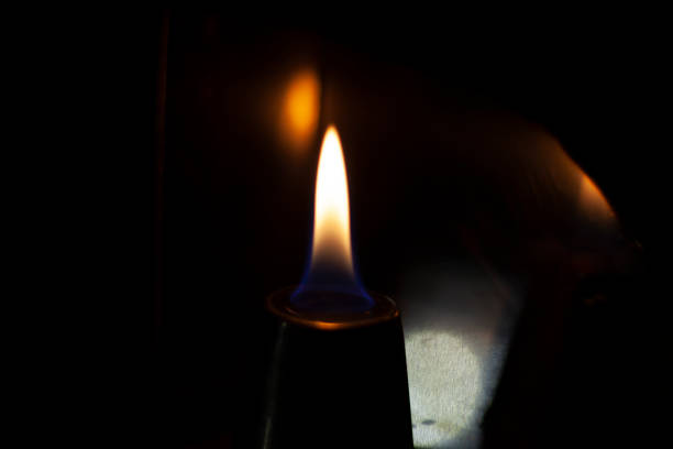 istock Flames of fire in the dark. 1202591287