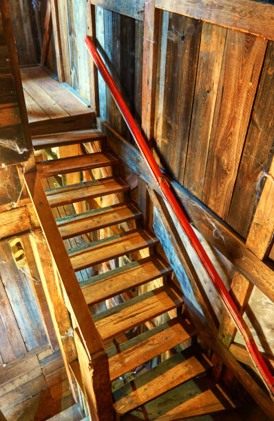 istock Old wooden stairs in a house. 1202591448