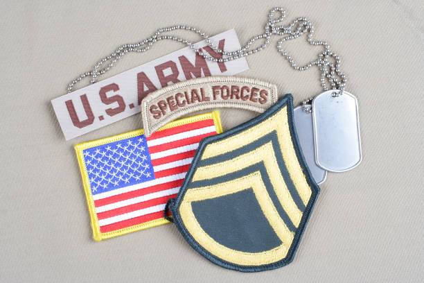 istock US ARMY Staff Sergeant rank patch, special forces tab, flag patch and dog tag 1202593049