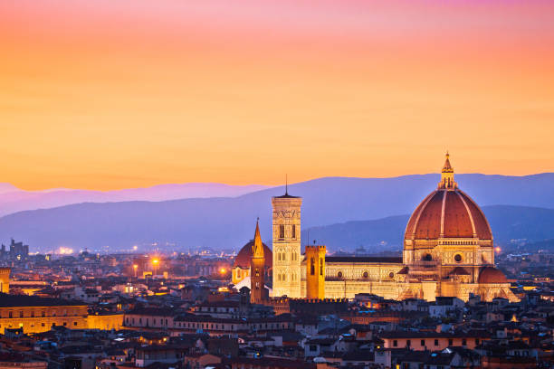istock Colorful Florence rooftops and Duomo view at sunset 1202595792