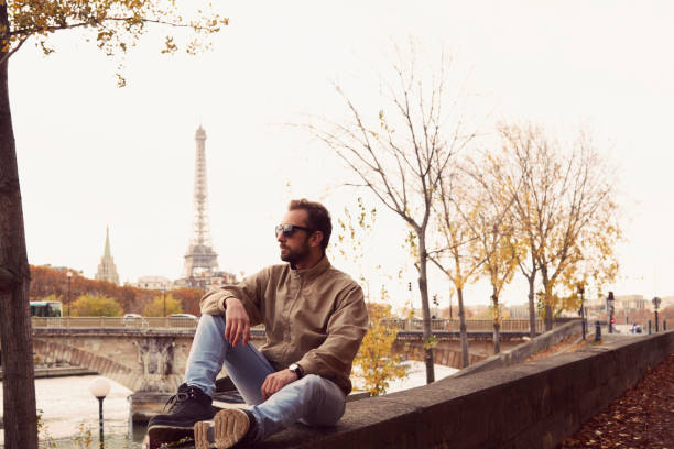 istock Handsome man enjoying in Paris. 1202596039