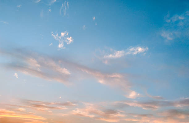 istock An orange sky textured background. Vertical orientation 1202598606