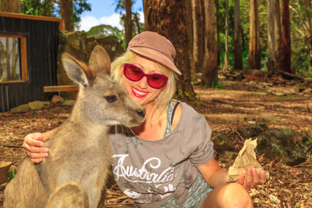 istock Woman with kangaroo 1202598714