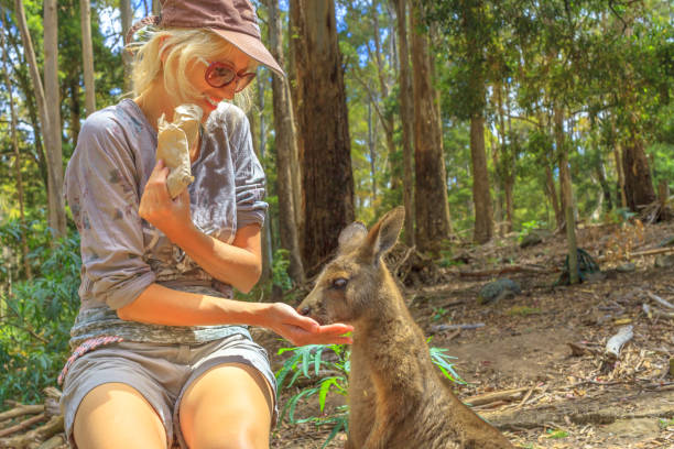 istock Woman with kangaroo 1202598728