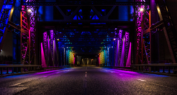 Lit during January with rainbow colours, Newport Bridge over the River Tees.