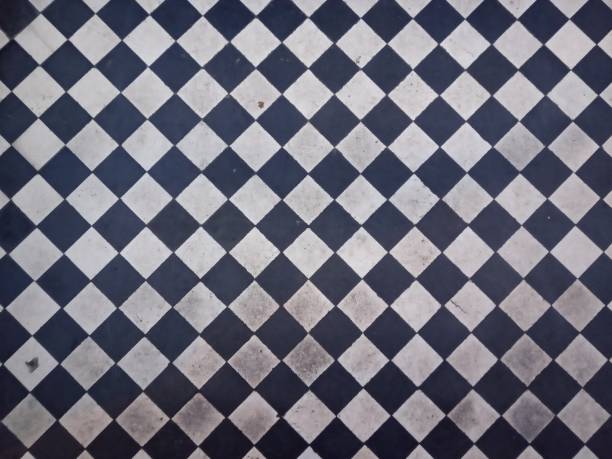 istock Checkered black while floor tiles for background in UK 1202605161