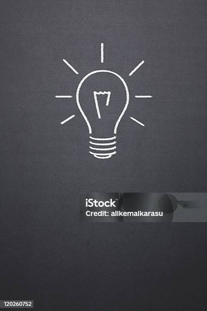 Blackboard With Chalk Drawing Of A Light Bulb Creativity Sign Stock Photo - Download Image Now