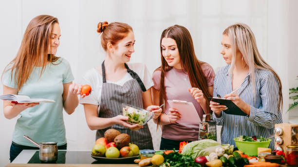 istock culinary class healthy eating course women cooking 1202612281