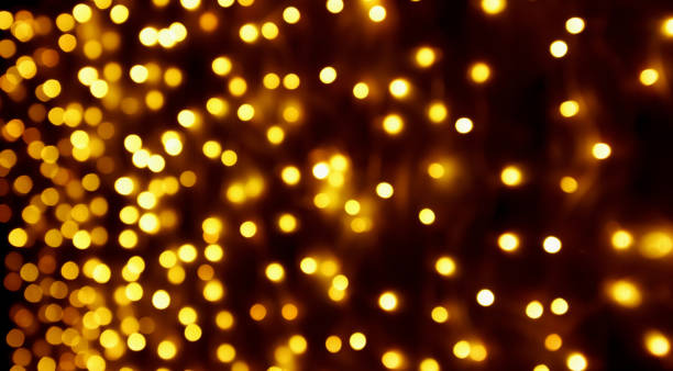 istock Abstract blur golden bokeh light Christmas holiday background 1202612311