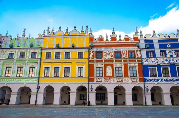 Great Market Square and row of old colourful buildings in the center of Zamosc city (The Pearl of Renaissance, UNESCO World Heritage), Poland