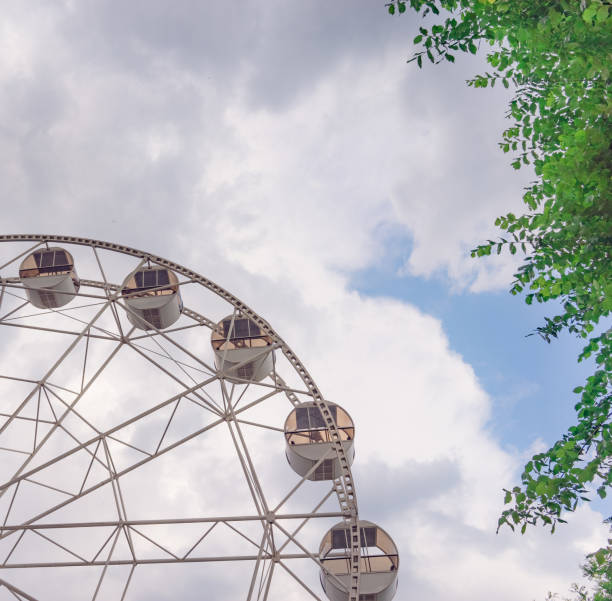 istock Ferris wheel against the sky with clouds 1202615010