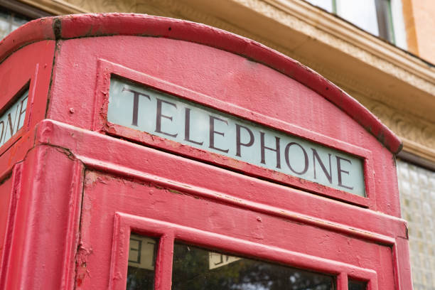 istock Old Retro Style Telephone Booth 1202619237
