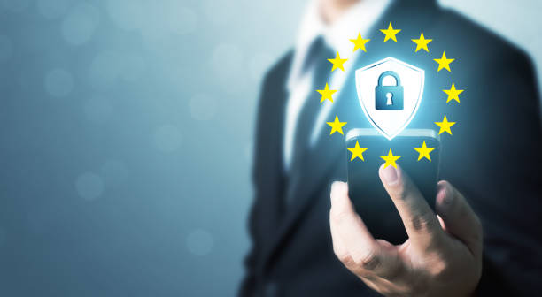 istock Protection network security mobile smart phone and safe your data concept. Digital crime by an anonymous hacker 1202623263