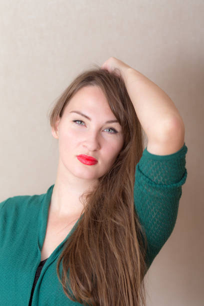 istock sensual woman with long hair 1202633887