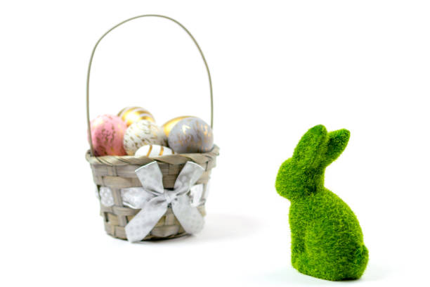 istock Happy Easter background. Colorful shine decorated eggs and green bunny isolated on white. For greeting card, promotion, poster, flyer, web-banner, article 1202636332