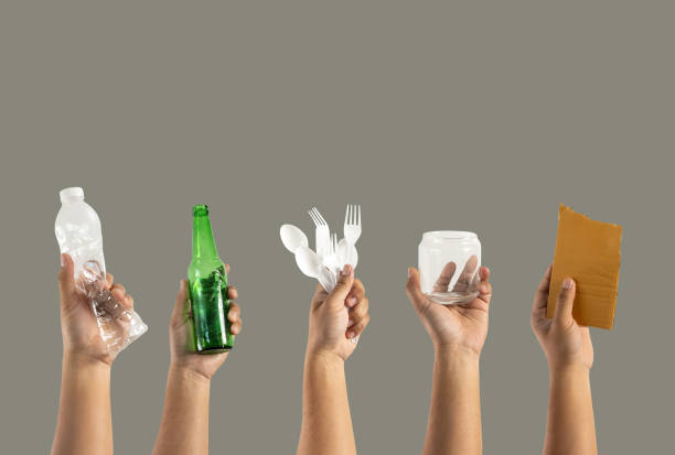 istock recycle  different types of garbage Ecology concept holding garbage bottle plastic and glass to types of garbage 1202642878