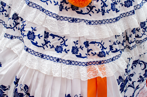 The patterns of this artisanal dress are all handmade by artisans using different embroidery techniques.