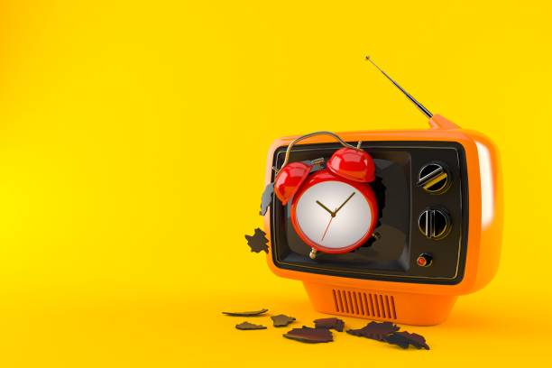 istock Retro TV with alarm clock 1202649181