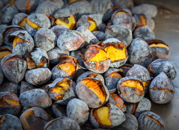 istock Bunch of roasted chestnuts 1202650356