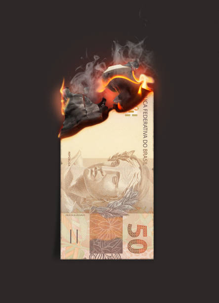 real burning cash note - worthless imagens e fotografias de stock