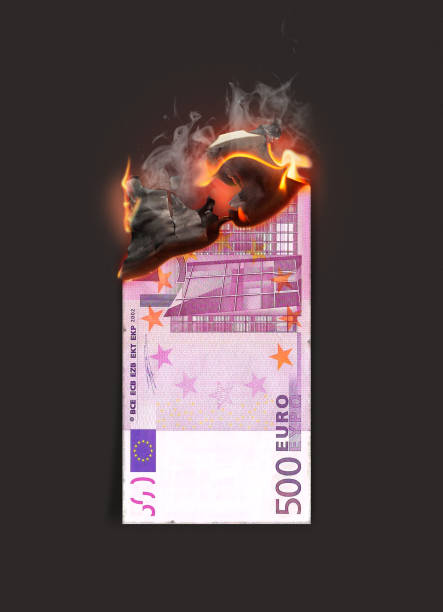 euro burning cash note - worthless imagens e fotografias de stock