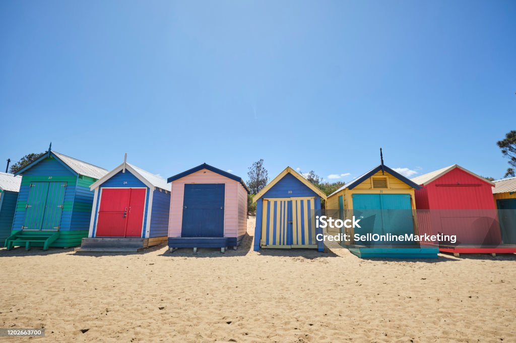 Brighton Beach Hutsboxes On A Blue Sky Sunny Day With Bright