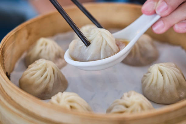 istock Fresh made steamed dumplings in asian restaurant in melbourne 1202664076