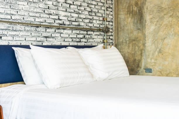 istock Pillow on bed decoration interior of bedroom interior 1202665918